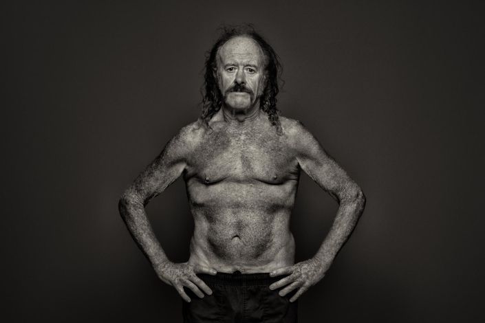 Man posing in a studio